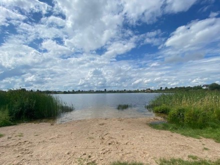 11.30 ARAI ŽEMĖS SKLYPAS PRIE ŠVENTININKŲ EŽERO, (TRAKŲ RAJ., ŠVENTININKŲ K.) 